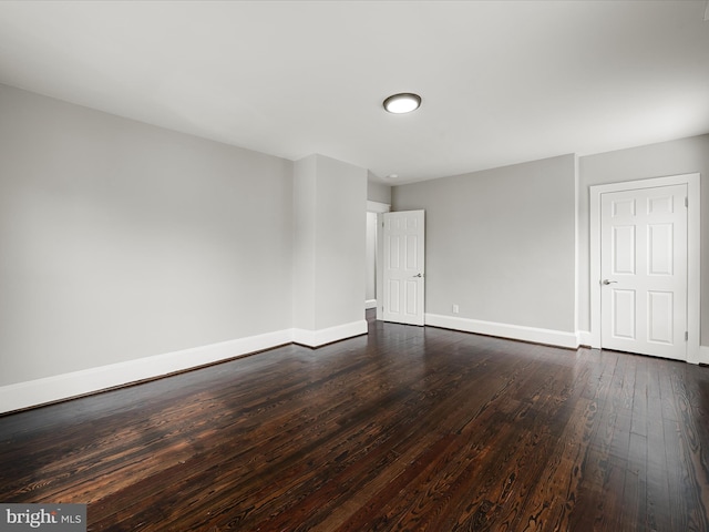 19 W Jackson St, Front Royal, VA 22630 - empty room featuring dark wood-type flooring and baseboards