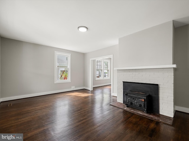 19 W Jackson St, Front Royal, VA 22630 - unfurnished living room with wood finished floors, baseboards, and a fireplace