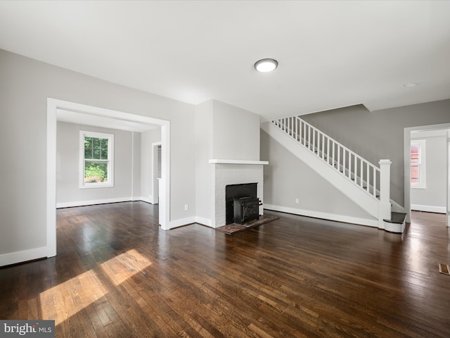 19 W Jackson St, Front Royal, VA 22630 - unfurnished living room featuring stairs, wood-type flooring, and baseboards