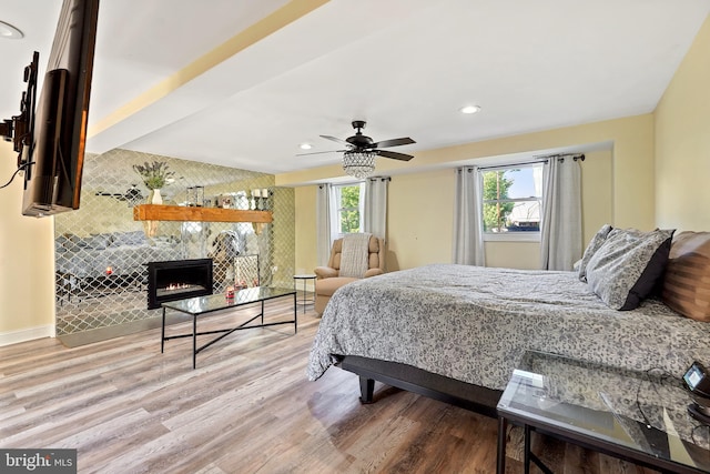 5 Neptune Ln, Willingboro, NJ 08046 - bedroom featuring wood finished floors, recessed lighting, a tiled fireplace, and baseboards