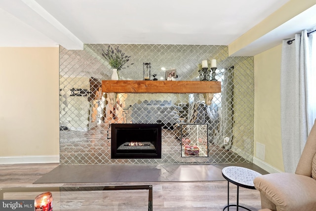 5 Neptune Ln, Willingboro, NJ 08046 - living room with wood finished floors, baseboards, and a tile fireplace