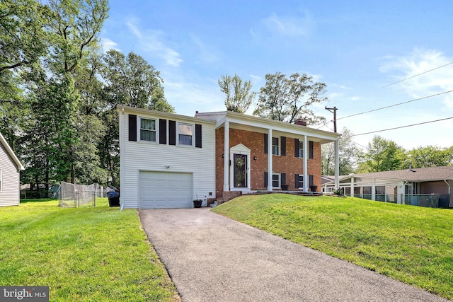 5 Neptune Ln, Willingboro, NJ 08046 - bi-level home with brick siding, driveway, a chimney, and a garage