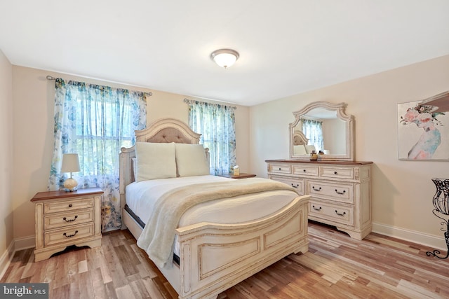 5 Neptune Ln, Willingboro, NJ 08046 - bedroom with light wood-style flooring and baseboards