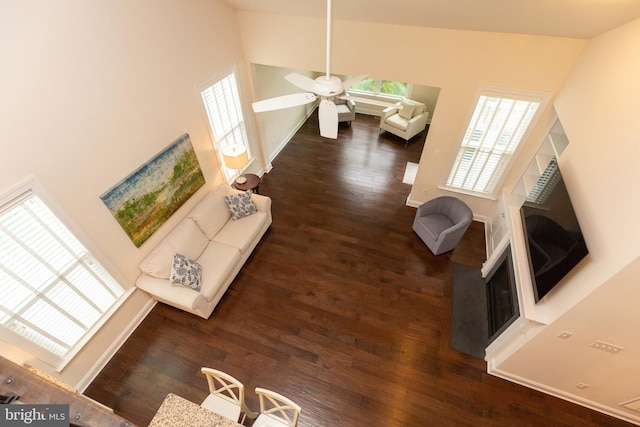 41259 Gloucester Dr, Rehoboth Beach, DE 19971 - living area with wood finished floors, a ceiling fan, high vaulted ceiling, and baseboards