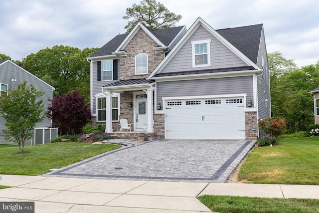 41259 Gloucester Dr, Rehoboth Beach, DE 19971 - craftsman house with stone siding, a standing seam roof, decorative driveway, and a front yard