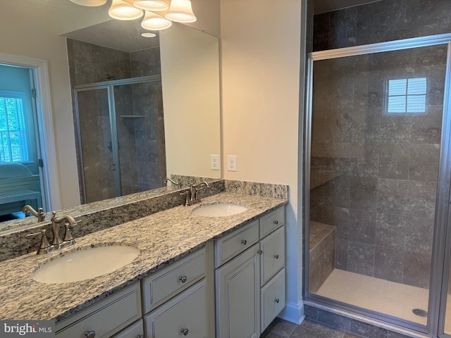 41259 Gloucester Dr, Rehoboth Beach, DE 19971 - bathroom featuring a shower stall and double vanity