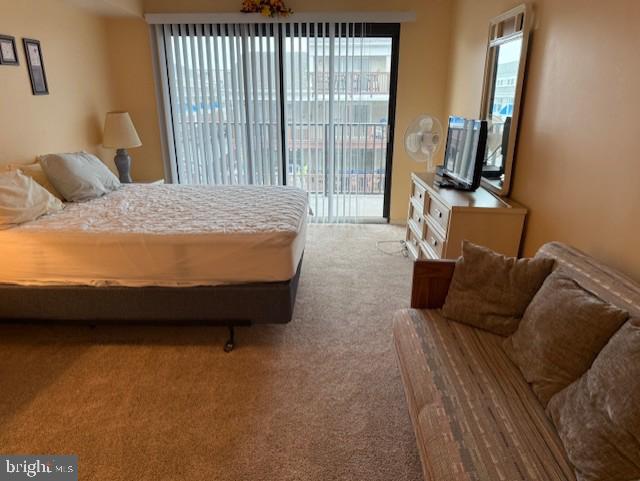 72nd St Unit 35, Ocean City, MD 21842 - bedroom featuring carpet flooring and access to outside