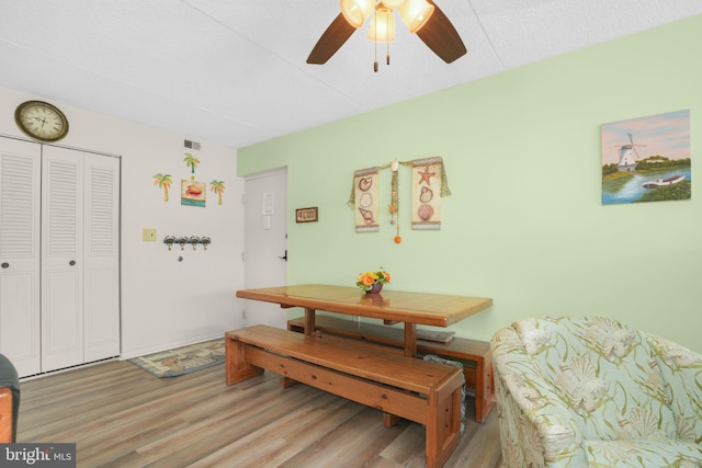 72nd St Unit 35, Ocean City, MD 21842 - dining area featuring light wood-style floors and ceiling fan