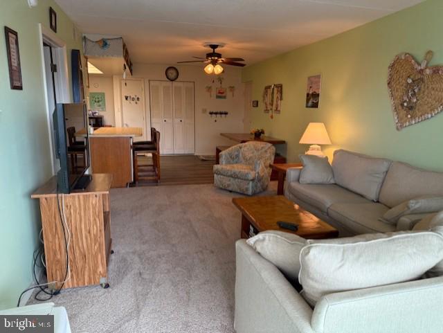 72nd St Unit 35, Ocean City, MD 21842 - living room featuring ceiling fan and carpet