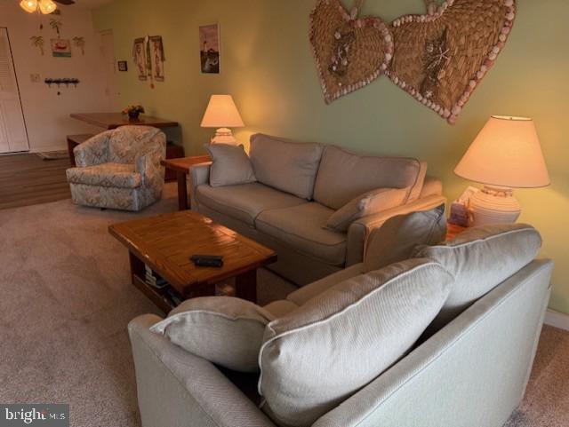 72nd St Unit 35, Ocean City, MD 21842 - carpeted living room with baseboards and ceiling fan
