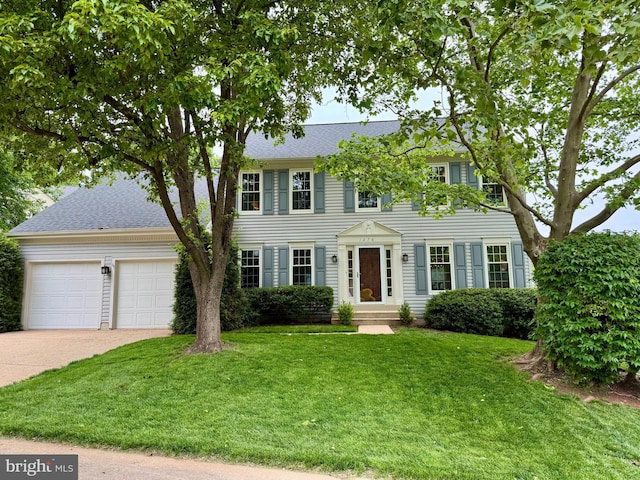 1276 Mason Mill Ct, Herndon, VA 20170 - colonial home featuring driveway, a front yard, a garage, and roof with shingles