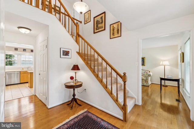 1276 Mason Mill Ct, Herndon, VA 20170 - stairway featuring hardwood / wood-style flooring and baseboards