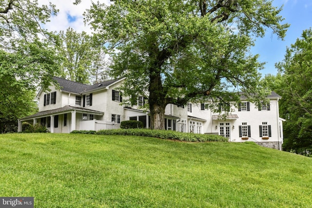 1435 Hunter View Farms, Vienna, VA 22182 - view of front of house with stucco siding and a front yard