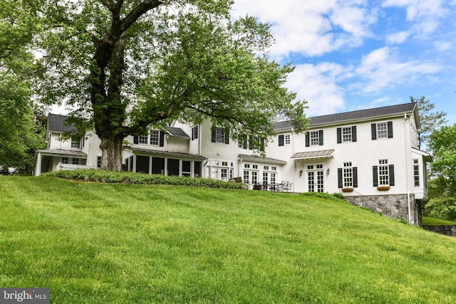 1435 Hunter View Farms, Vienna, VA 22182 - rear view of property with french doors, a lawn, and stucco siding