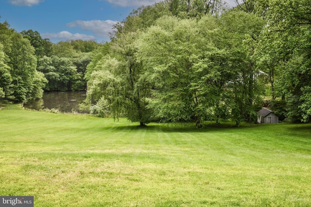 1435 Hunter View Farms, Vienna, VA 22182 - view of grassy yard with a wooded view and a water view