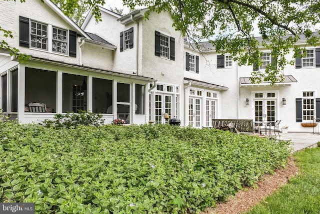 1435 Hunter View Farms, Vienna, VA 22182 - back of property with french doors, stucco siding, and a sunroom