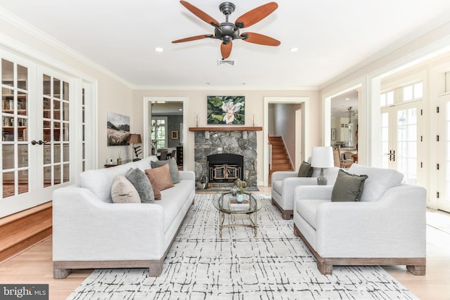 1435 Hunter View Farms, Vienna, VA 22182 - living area with french doors, ceiling fan, wood finished floors, ornamental molding, and recessed lighting