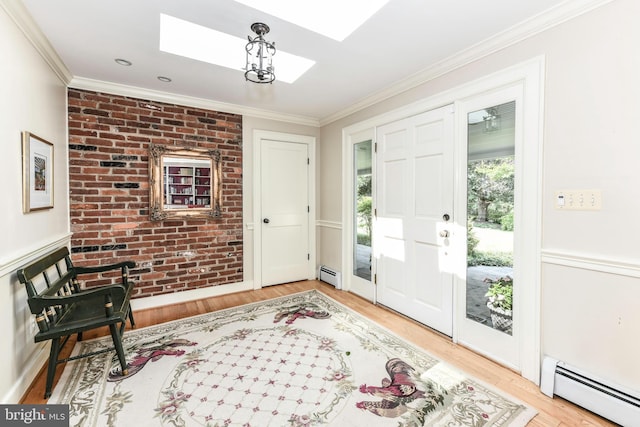 1435 Hunter View Farms, Vienna, VA 22182 - foyer featuring a baseboard radiator, a skylight, wood finished floors, and ornamental molding