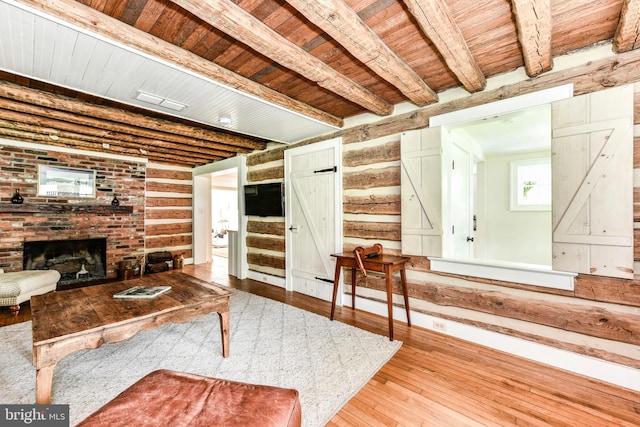 1435 Hunter View Farms, Vienna, VA 22182 - living area featuring wood ceiling with exposed beams, hardwood / wood-style flooring, and a fireplace