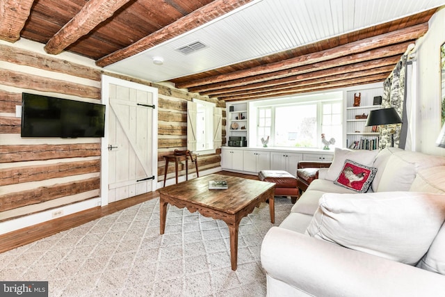 1435 Hunter View Farms, Vienna, VA 22182 - living area featuring wooden ceiling with exposed beams, wood walls, wood finished floors, and a barn door
