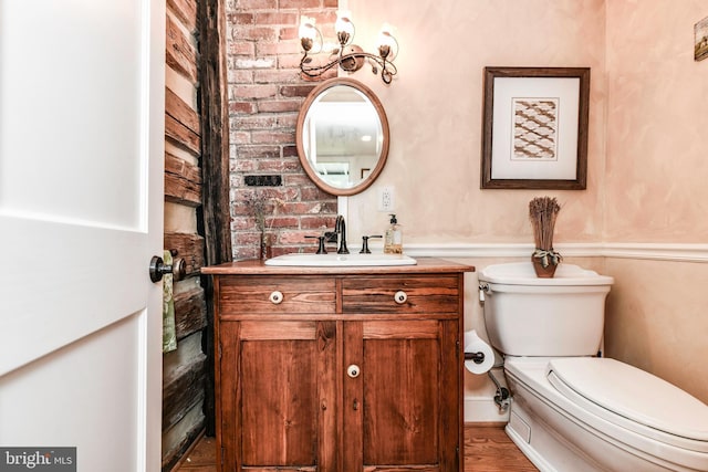 1435 Hunter View Farms, Vienna, VA 22182 - bathroom featuring toilet, vanity, and wood finished floors