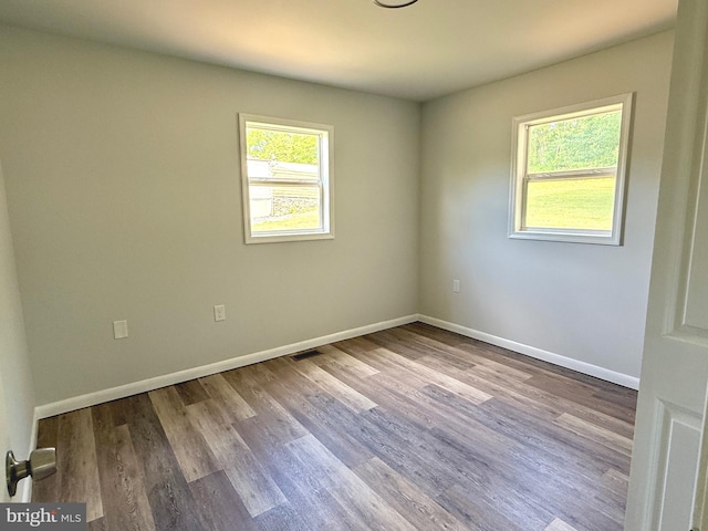 20 Flying Dove Ln, Hedgesville, WV 25427 - spare room featuring wood finished floors and baseboards