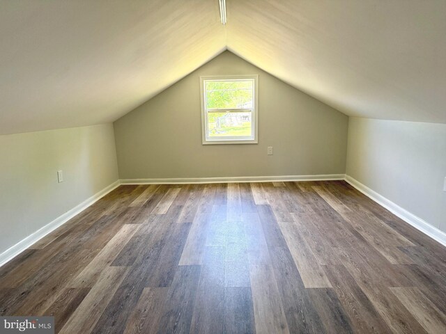 20 Flying Dove Ln, Hedgesville, WV 25427 - bonus room featuring vaulted ceiling, dark wood-style flooring, and baseboards