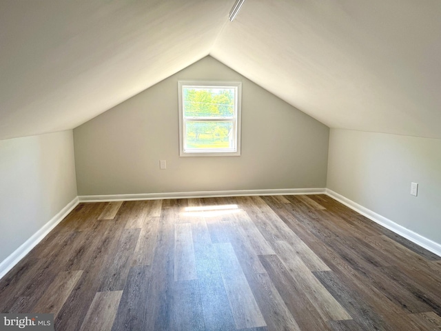 20 Flying Dove Ln, Hedgesville, WV 25427 - bonus room featuring dark wood-type flooring, vaulted ceiling, and baseboards