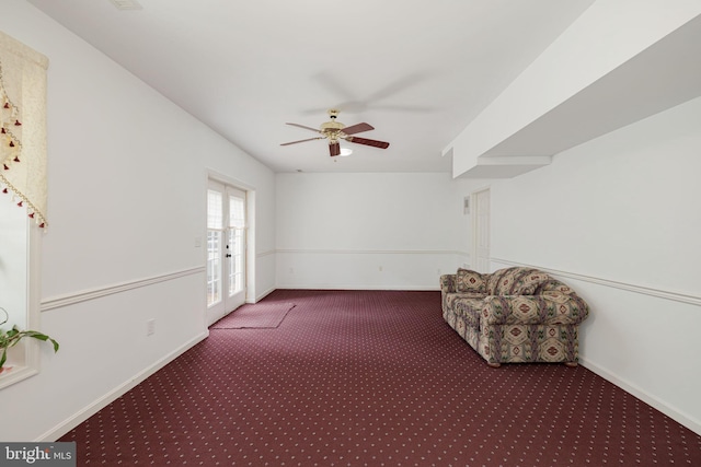 unfurnished room with carpet floors, french doors, a ceiling fan, and baseboards