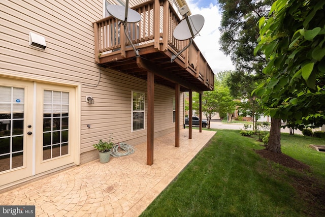 view of patio with a deck and french doors