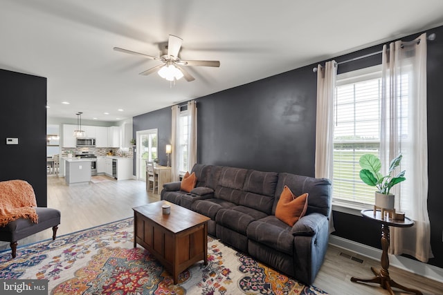 220 Ladysmith Dr, Stephens City, VA 22655 - living room featuring light wood-style floors, a ceiling fan, and recessed lighting