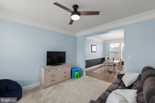 220 Ladysmith Dr, Stephens City, VA 22655 - living room with crown molding, baseboards, ceiling fan, and a chandelier