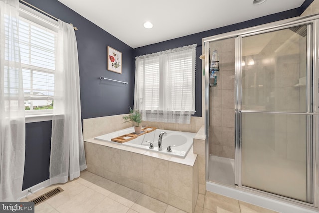 220 Ladysmith Dr, Stephens City, VA 22655 - bathroom featuring tile patterned flooring, a garden tub, and a stall shower