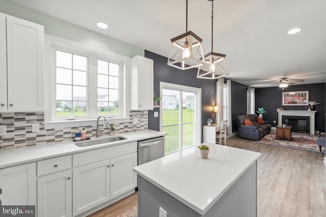 220 Ladysmith Dr, Stephens City, VA 22655 - kitchen featuring a sink, backsplash, white cabinets, and recessed lighting