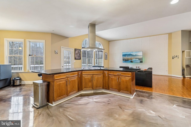 13716 Molly Berry Rd, Brandywine, MD 20613 - kitchen with island exhaust hood, brown cabinetry, baseboards, open floor plan, and a kitchen island