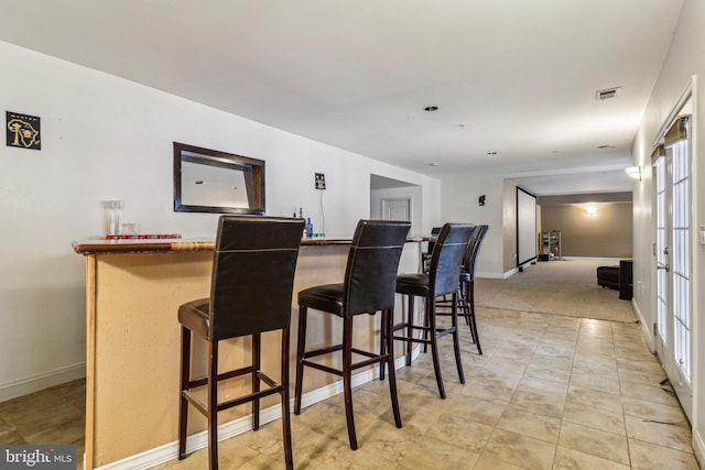 13716 Molly Berry Rd, Brandywine, MD 20613 - indoor dry bar with baseboards and plenty of natural light