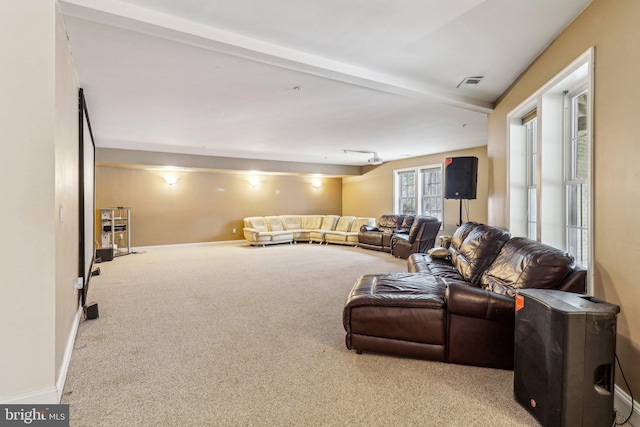 13716 Molly Berry Rd, Brandywine, MD 20613 - carpeted living room featuring baseboards and beamed ceiling
