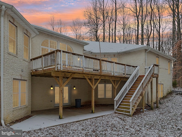 13716 Molly Berry Rd, Brandywine, MD 20613 - rear view of house with brick siding, a deck, and a patio
