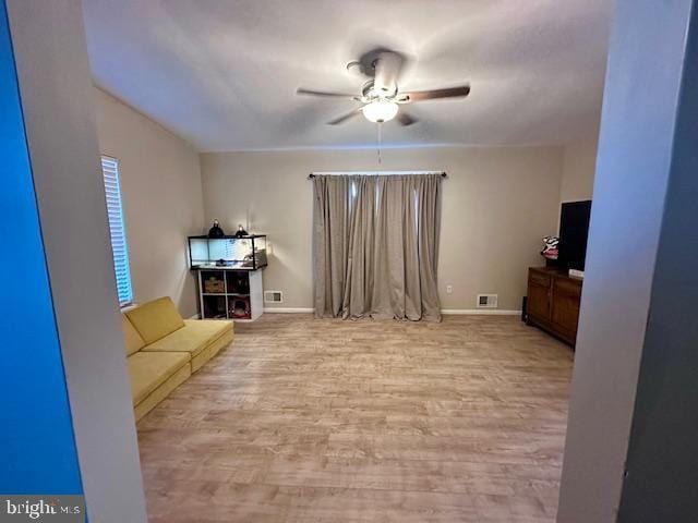 2513 Oakley Pl, Pennsauken, NJ 08109 - living area with a ceiling fan, wood finished floors, and baseboards