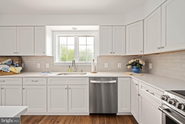 11490 Tilia Ln, Bealeton, VA 22712 - kitchen with stainless steel appliances, a sink, white cabinetry, and backsplash