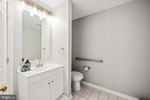 11490 Tilia Ln, Bealeton, VA 22712 - bathroom with tile patterned floors, vanity, toilet, and baseboards