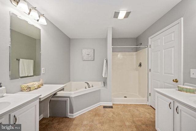 11490 Tilia Ln, Bealeton, VA 22712 - full bathroom with two vanities, a shower, a tub with jets, and baseboards