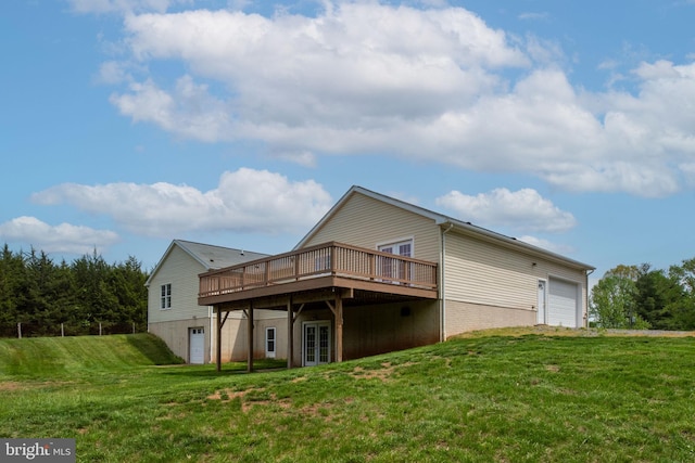 11490 Tilia Ln, Bealeton, VA 22712 - rear view of property featuring a wooden deck, a lawn, a garage, and french doors