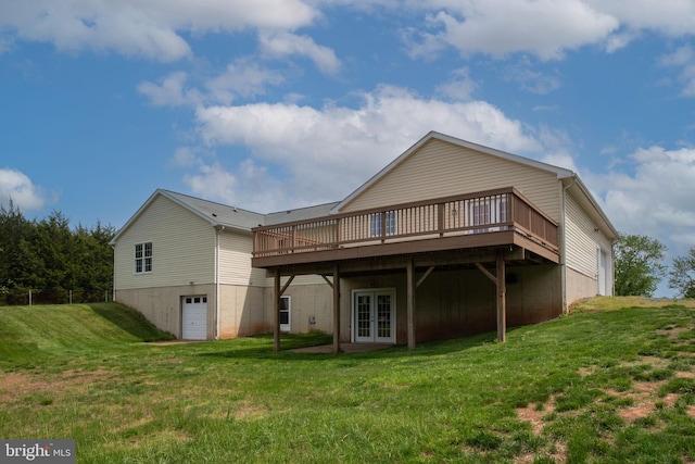 11490 Tilia Ln, Bealeton, VA 22712 - back of property featuring french doors, a wooden deck, a yard, and an attached garage
