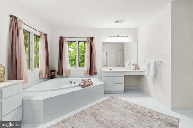 3747 Spicebush Dr, Frederick, MD 21704 - bathroom with vanity, a garden tub, tile patterned flooring, and baseboards
