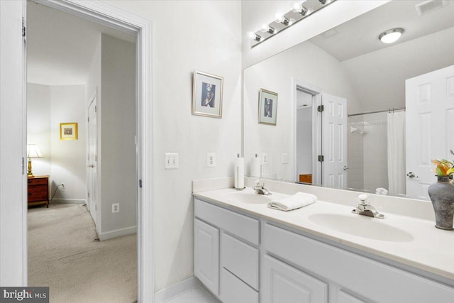 3747 Spicebush Dr, Frederick, MD 21704 - bathroom with double vanity, baseboards, lofted ceiling, and a shower with curtain