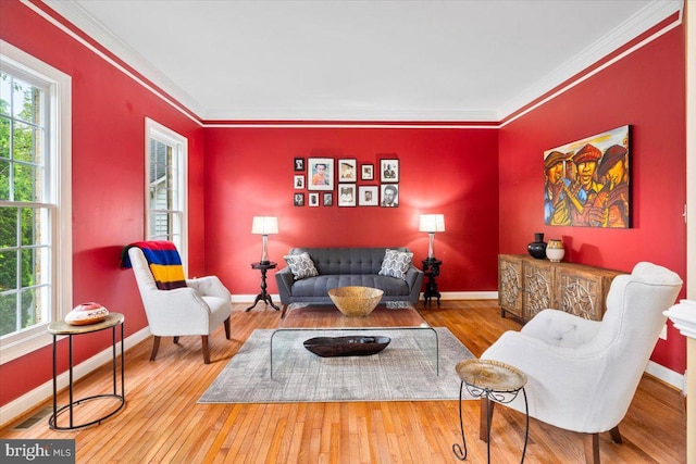 3747 Spicebush Dr, Frederick, MD 21704 - living room with crown molding, hardwood / wood-style floors, and baseboards