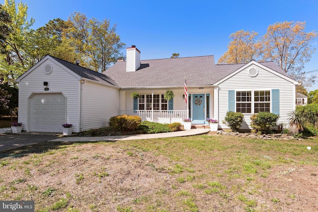 316 Nautilus Dr, Manahawkin, NJ 08050 - view of front of home featuring a porch, an attached garage, a chimney, asphalt driveway, and a shingled roof