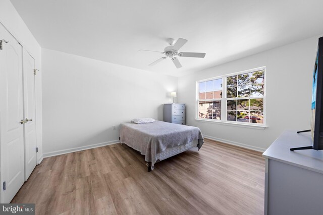 316 Nautilus Dr, Manahawkin, NJ 08050 - bedroom featuring wood finished floors, baseboards, and a ceiling fan