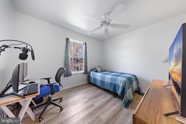 316 Nautilus Dr, Manahawkin, NJ 08050 - bedroom featuring light wood-style floors, an office area, baseboards, and a ceiling fan